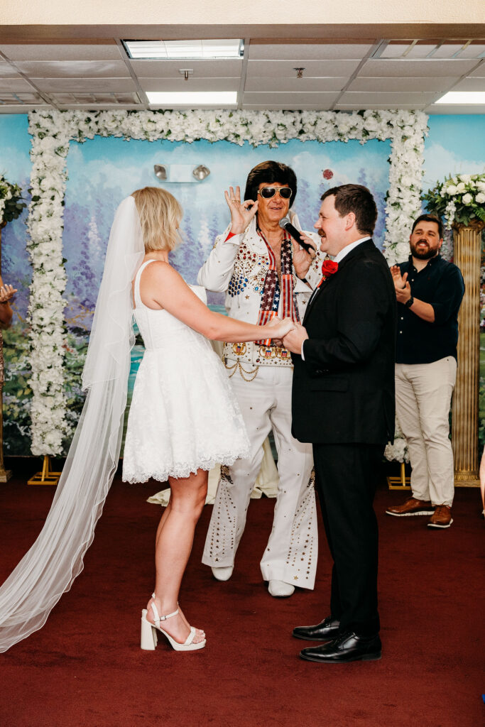 bride and groom laughing with each other during their elopement ceremony