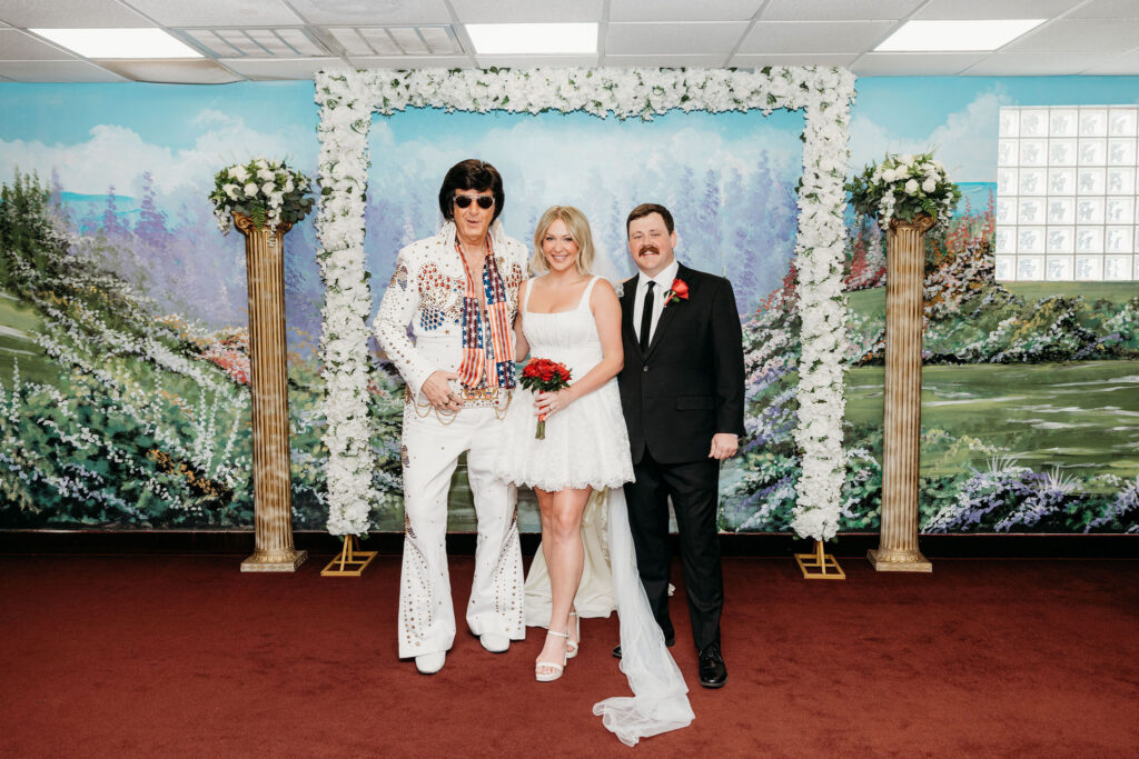 portrait of the newlyweds with Elvis