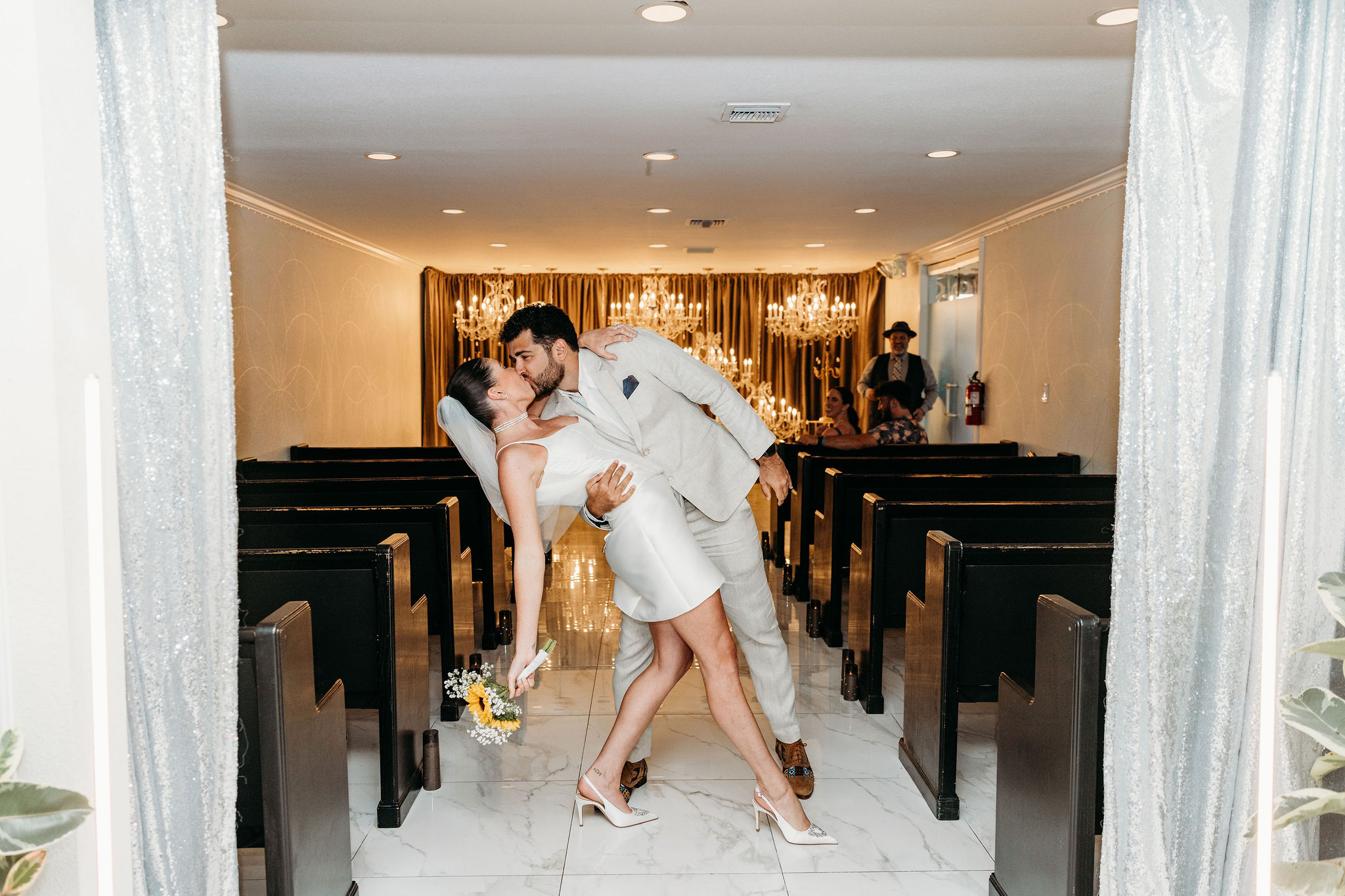 cute picture of the newlyweds kissing