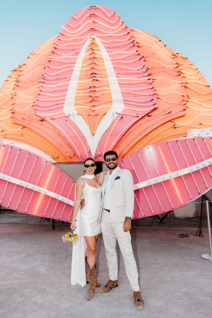 couple smiling at the camera during their photoshoot