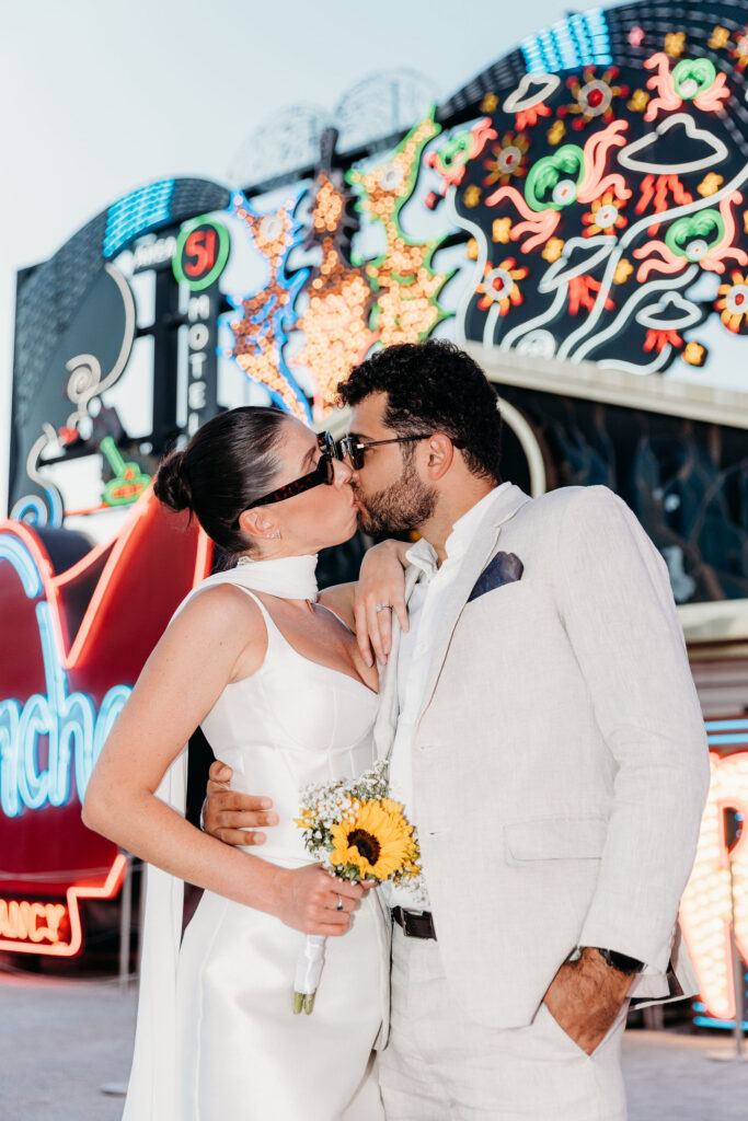 beautiful portrait of the newlyweds kissing