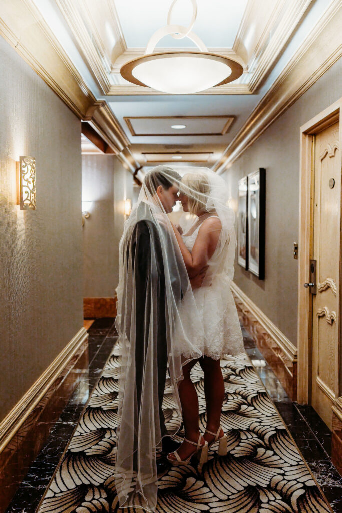 cute picture of the bride and groom kissing